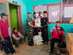 Babinsa Lanas Posramil 0822/14 Botolinggo Dampingi penyaluran beras bantuan pangan tahap II