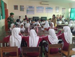 Ribuan Pelajar Terima Makan Bergizi Gratis, Babinsa 0822 Dampingi Distribusi SPPG Bondowoso